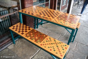 Chess board outside tables
